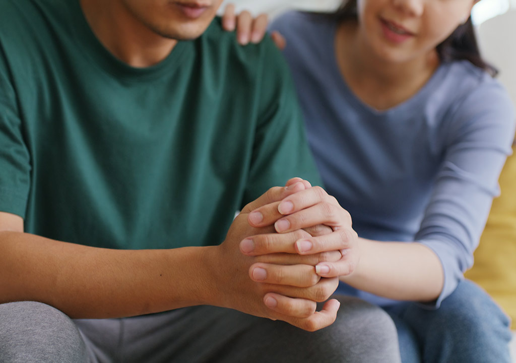 bcss british columbia schizophrenia society people in family showing support by holding hands