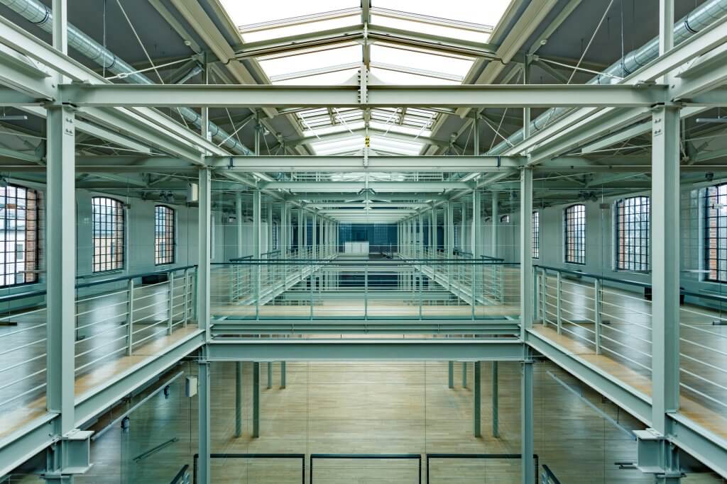 Warehouse or prison? Modern industrial interior with balustrades